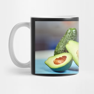 Fresh avocado on a table Mug